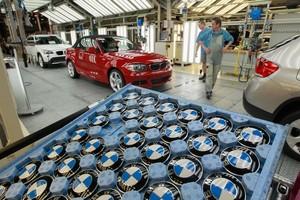 germany bmw leipzig workers twice assembly paying builds while much many its cars plant